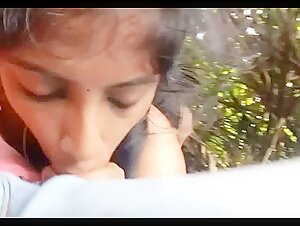 Young Indian Teen sucking her bf dick in the jungle
